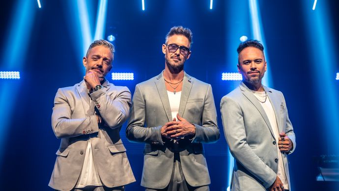 Charly Luske, Tommie Christiaan en Sonny Sinay op het podium